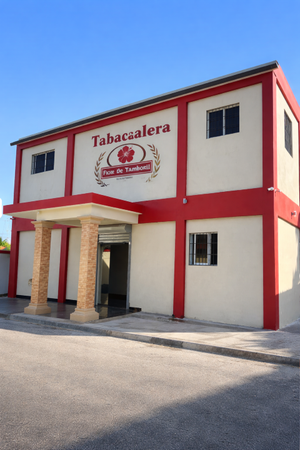 Flor de Tamboril cigar factory tour in Santiago, Dominican Republic featuring skilled cigar rolling artisans