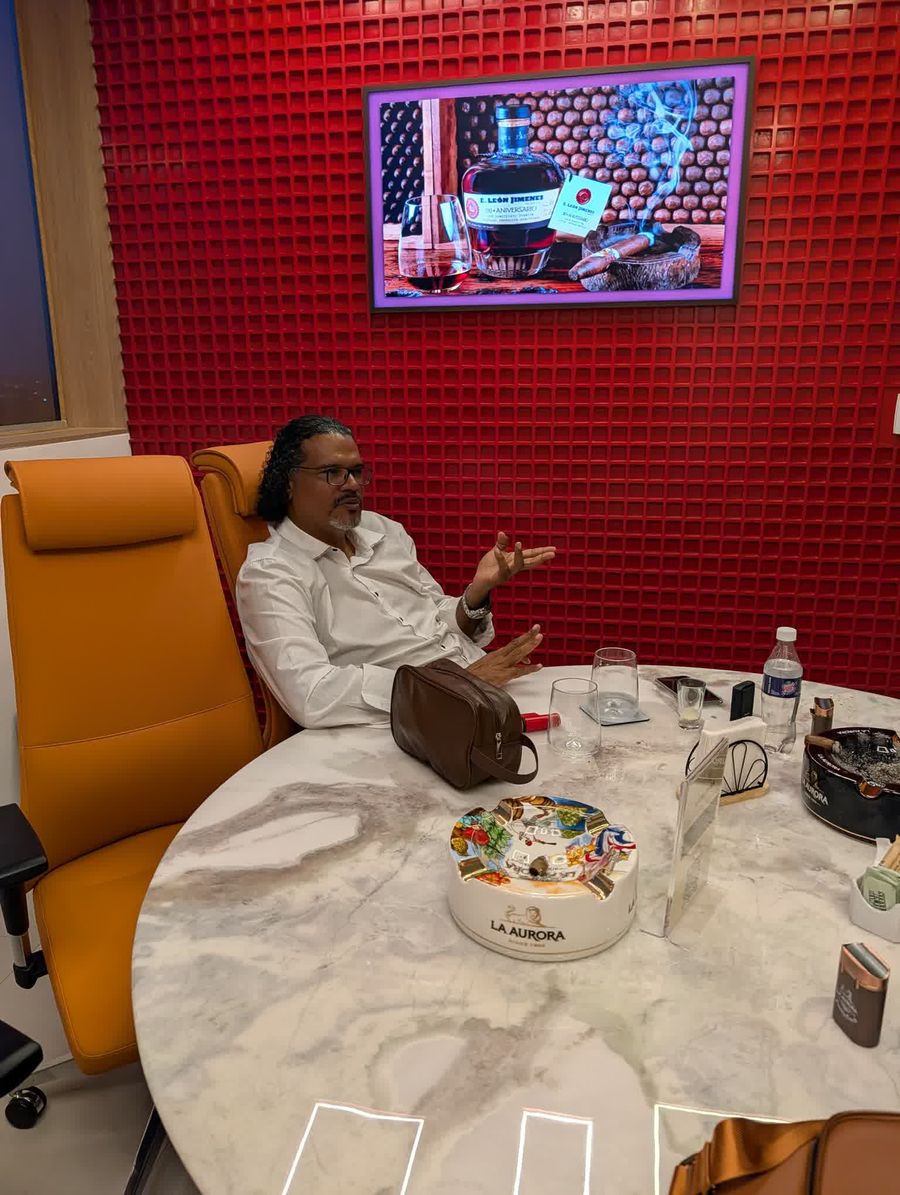 Sales team discussing strategy in a modern private meeting room